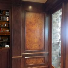 Faux burl and wood grained walls in room